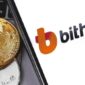 Logo pertukaran cryptocurrency Bithumb ditempatkan di samping dua logo Bitcoin dan Ether. Foto oleh Primakov/Shutterstock